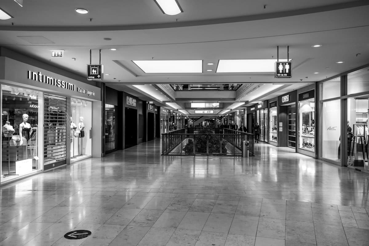 Retail Cleaning in Westminster - Empty shopping mall corridor with spotless storefronts